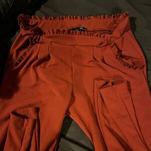 Soho apparel pants. Rust color